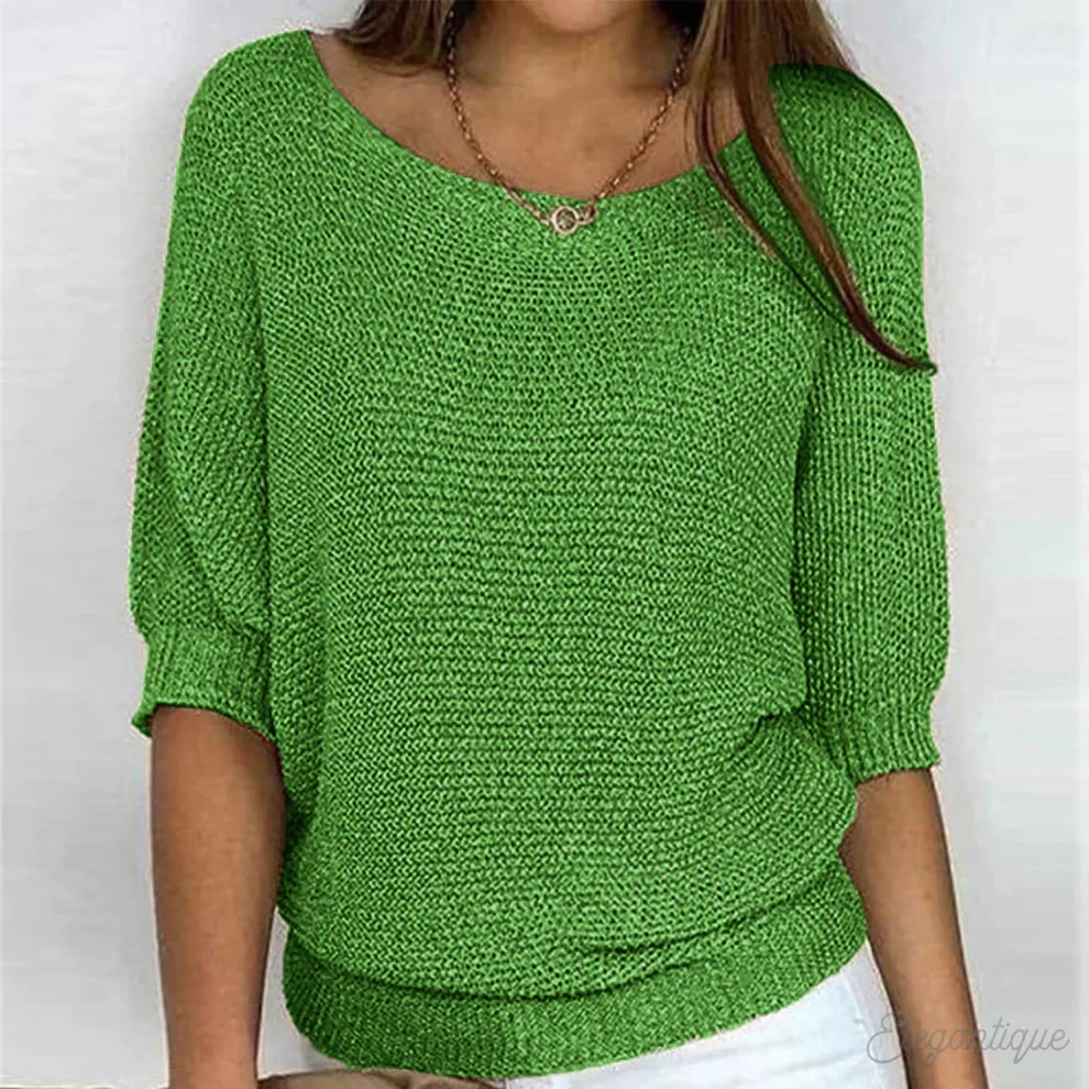 Pullover mit Dreiviertelärmeln in Grün, getragen von einem Model